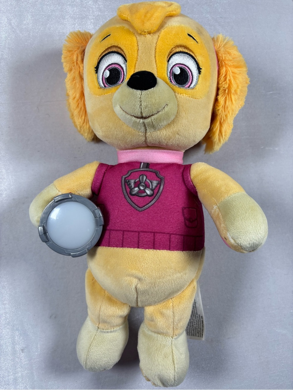 PAW Patrol Skye “Snuggle Up” plush with flashlight and sounds/music.